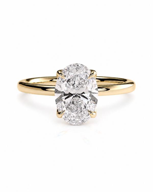 color_10K_YG, color_14K_YG &&A yellow gold ring with a large oval-cut diamond center stone, set against a clean white background.