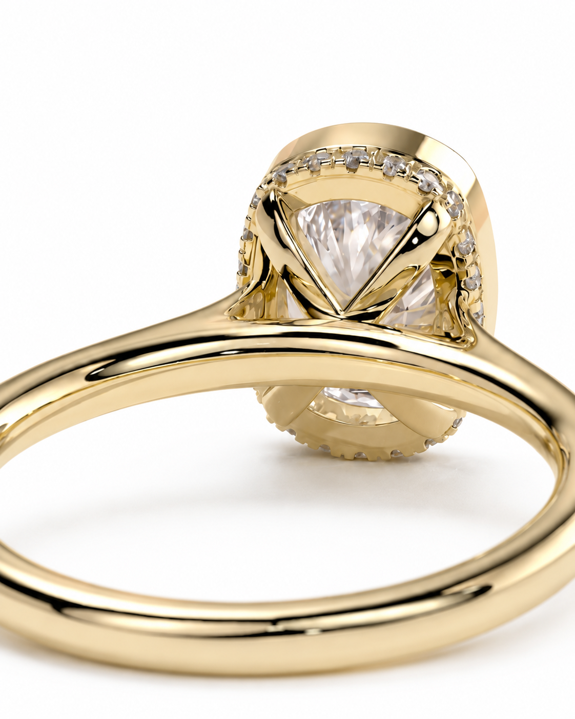 color_10K_YG, color_14K_YG &&A close-up shot of a yellow gold ring featuring a large clear marquise-cut center stone surrounded by small pavé-set diamonds, on a clean white background.