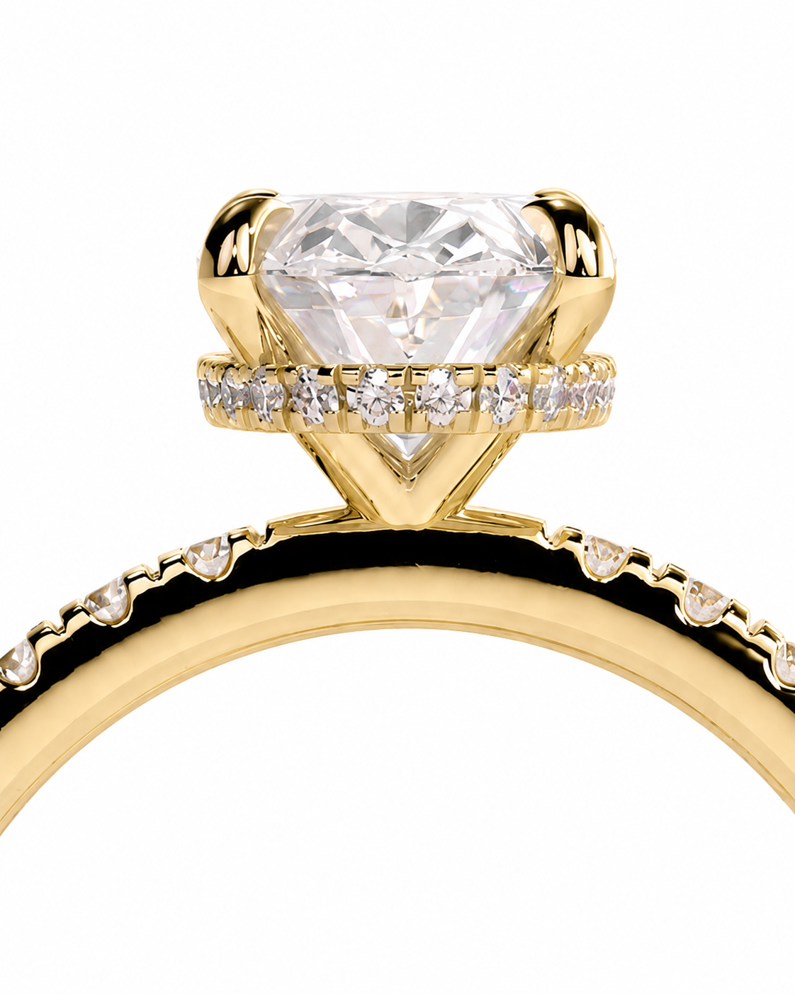 color_10K_YG, color_14K_YG &&A close-up of a yellow gold diamond ring featuring a large round-cut center stone and a halo of small diamonds, shown against a plain white background.