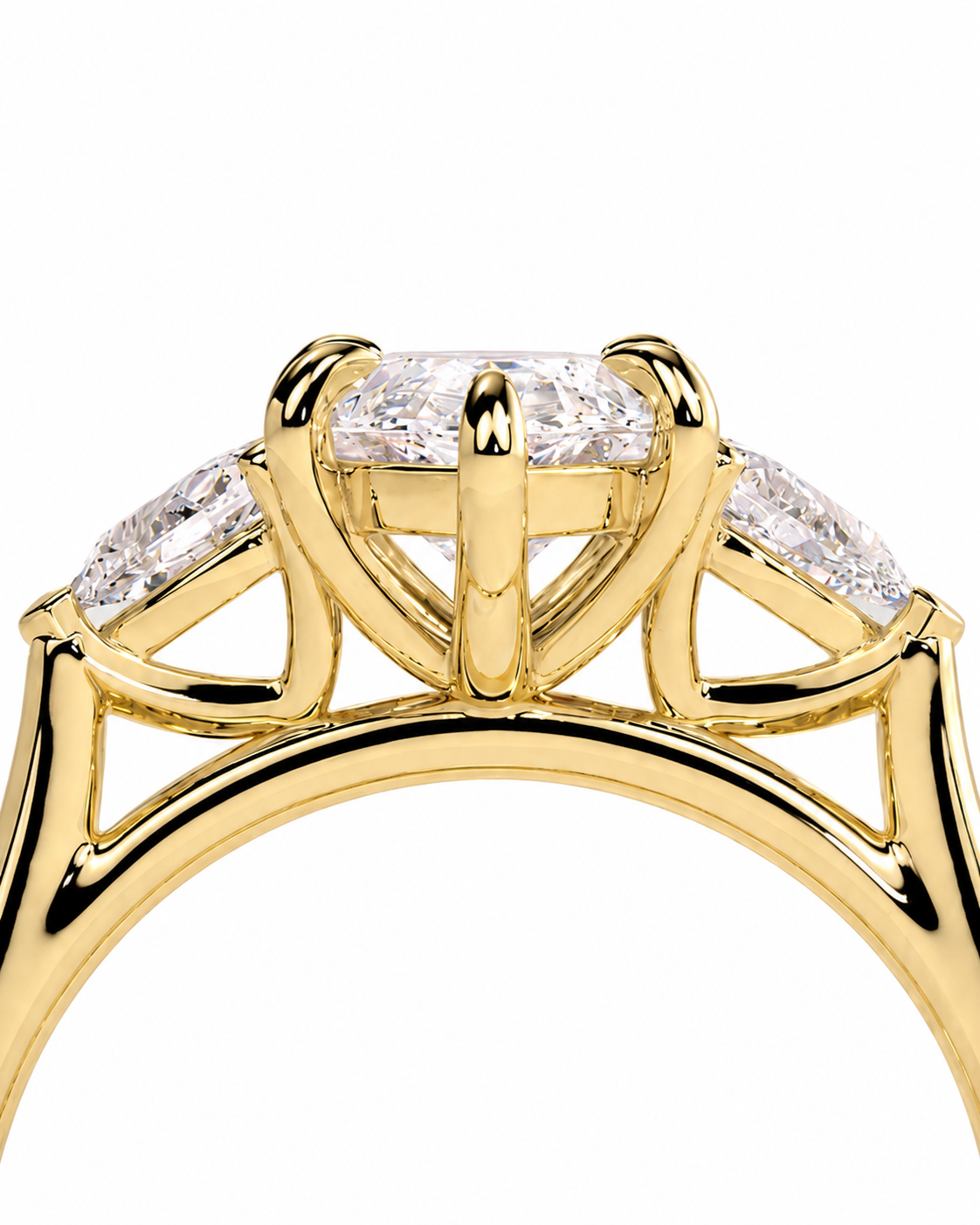 color_10K_YG, color_14K_YG &&A close-up of a yellow gold ring setting featuring a large center diamond flanked by two smaller marquise-cut diamonds, shown against a plain white background.