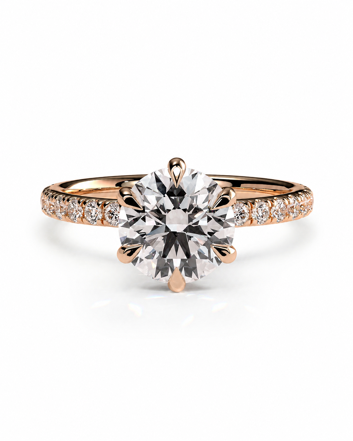 color_10K_RG, color_14K_RG &&
A rose gold solitaire engagement ring with a large round brilliant-cut center stone and a pave band set with small round stones, shown on a clean white background.