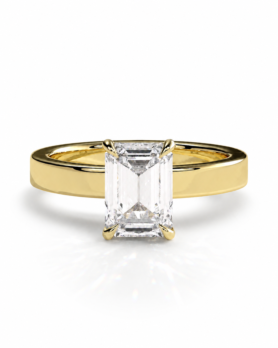 color_10K_YG, color_14K_YG &&A yellow gold solitaire engagement ring featuring a large rectangular emerald-cut clear center stone, set against a clean white background with a soft reflection.
