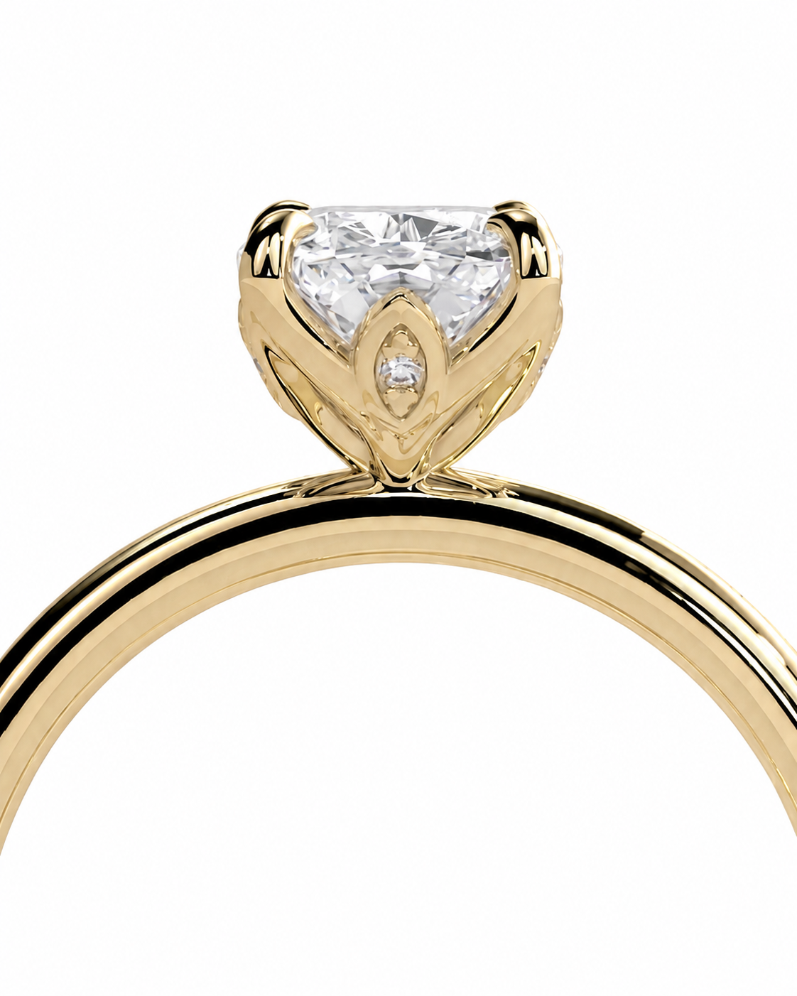 color_10K_YG, color_14K_YG &&A close-up of a yellow gold ring featuring a large clear rectangular gemstone in a decorative four-prong setting with a small accent stone, shown on a plain white background.