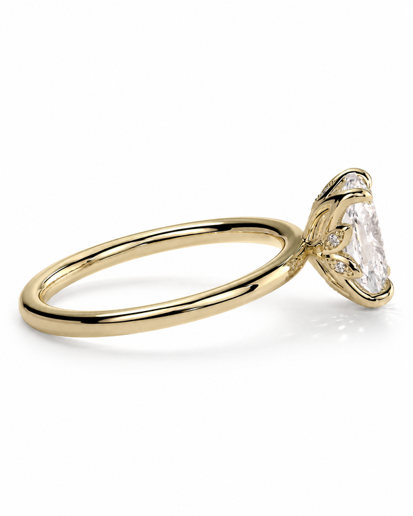 color_10K_YG, color_14K_YG &&A yellow gold solitaire engagement ring featuring a large clear marquise-cut diamond, set in a four-prong setting on a polished band, shown against a plain white background.