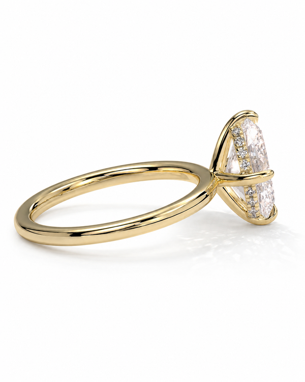 color_10K_YG, color_14K_YG &&A yellow gold ring featuring a triangular cluster of clear gemstones, photographed on a clean white background.