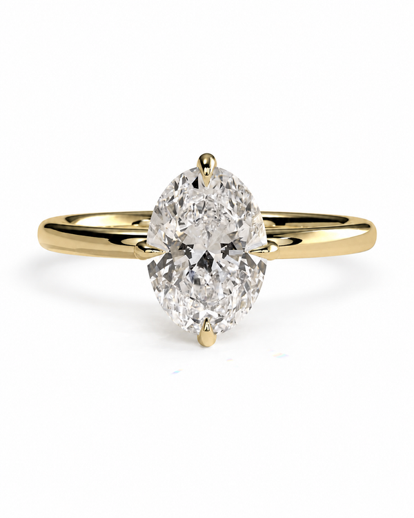color_10K_YG, color_14K_YG &&A yellow gold solitaire ring featuring a large oval-cut diamond, set against a clean white background.