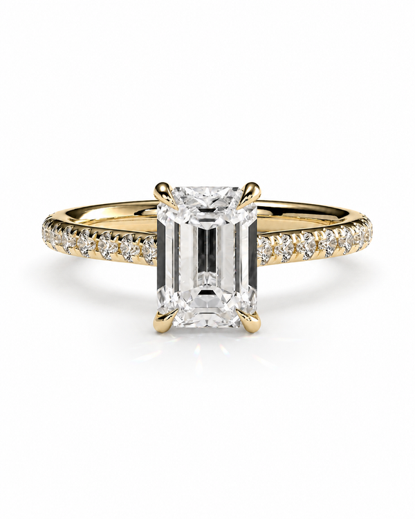 color_10K_YG, color_14K_YG &&A yellow gold engagement ring featuring a large emerald-cut diamond center stone and a pavé-set diamond halo along the band, shown on a clean white background.