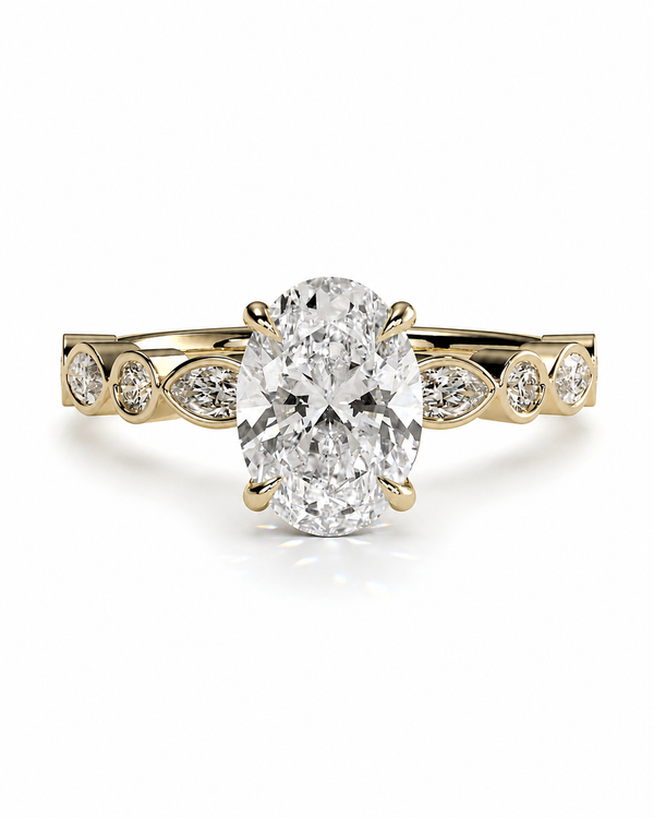 color_10K_YG, color_14K_YG &&An oval diamond engagement ring with a yellow gold band featuring marquise-cut diamonds on either side of the center stone, set against a clean white background.