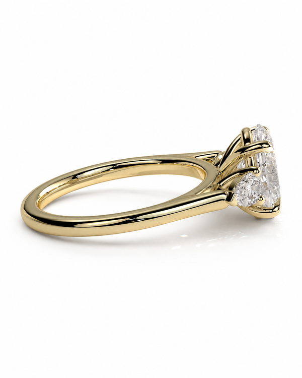 color_10K_YG, color_14K_YG &&
A yellow gold ring with a brilliant round-cut diamond set in a three-stone cluster arrangement, shown on a clean white background.