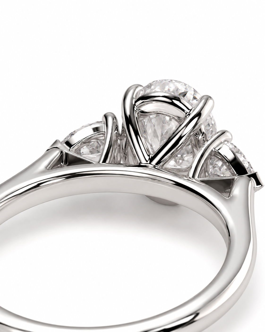 color_925_SIL,color_935_ARG,color_10K_WG, color_14K_WG &&
Close-up of a silver-toned diamond ring with a large round center stone and smaller side stones in a prong setting, shown on a white background.