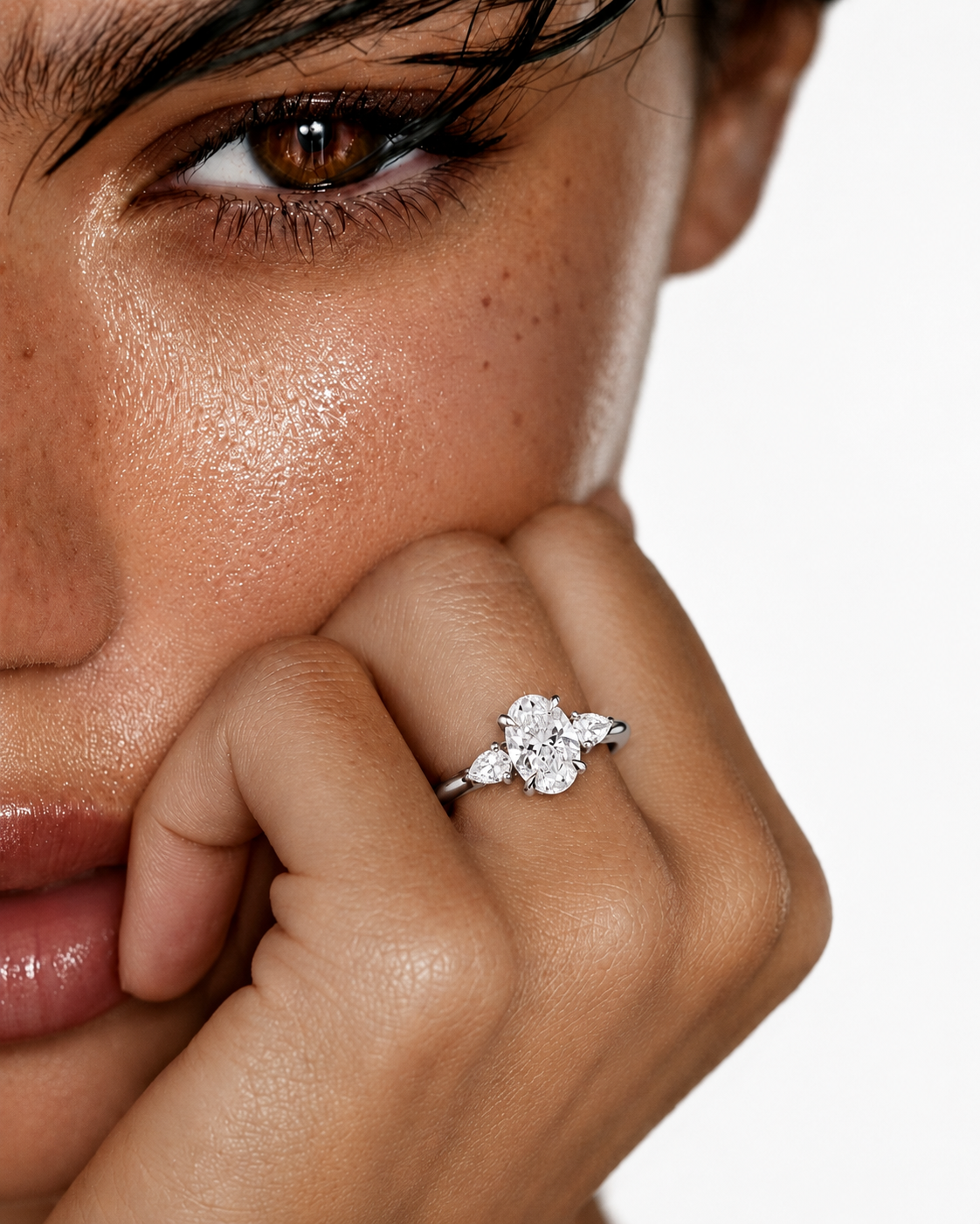 color_925_SIL,color_935_ARG,color_10K_WG, color_14K_WG &&
A close-up lifestyle shot of a model wearing a silver-toned ring with a floral cluster of clear gemstones on her finger, set against a clean white background.