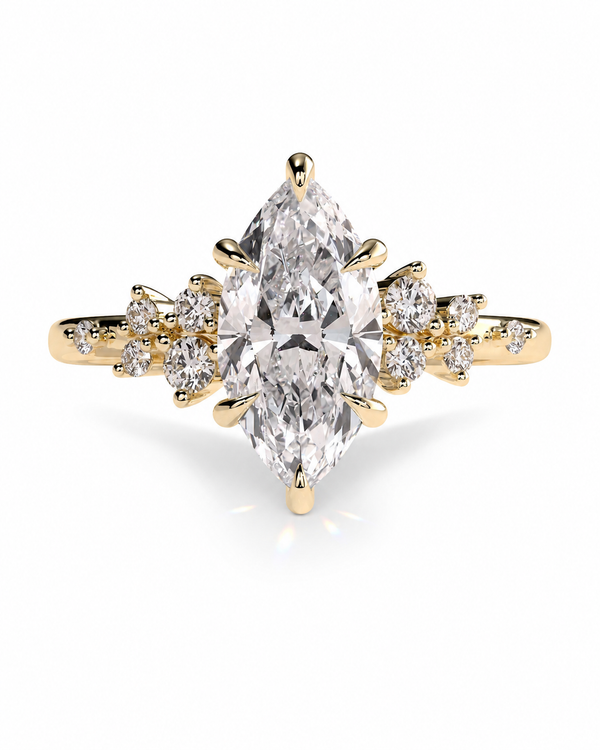 color_10K_YG, color_14K_YG &&A yellow gold ring featuring a large marquise-cut diamond center stone with smaller round diamonds set along the shoulders, shown on a clean white background.