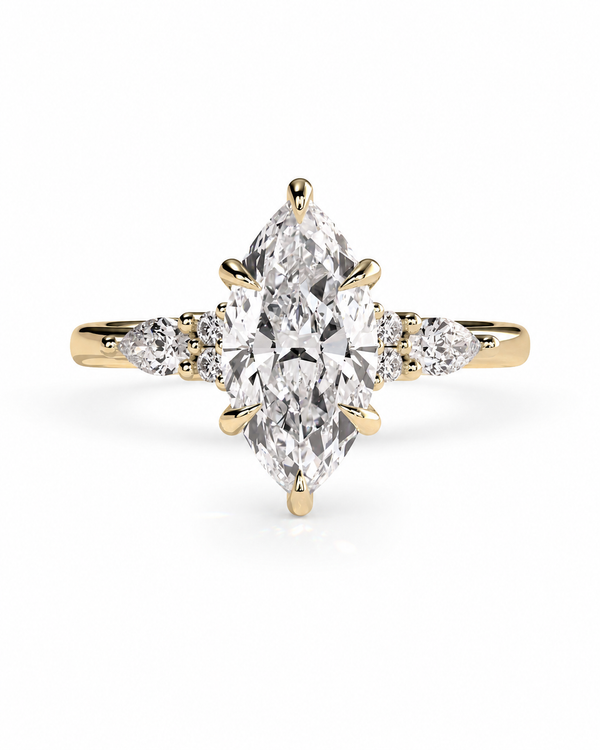 color_10K_YG, color_14K_YG &&A yellow gold ring featuring a marquise-cut center diamond flanked by smaller round diamonds on the band, set against a clean white background.