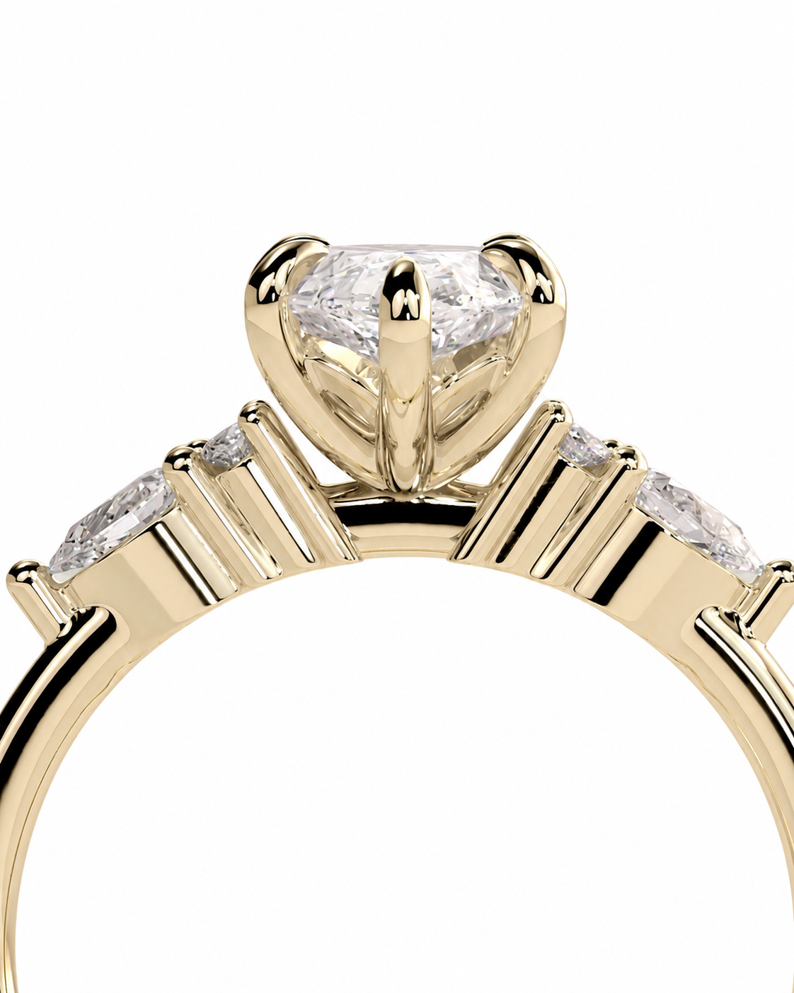 color_10K_YG, color_14K_YG &&A close-up of a yellow gold ring featuring a large heart-shaped clear gemstone in a prong setting, with smaller marquise-cut side stones on a white background.