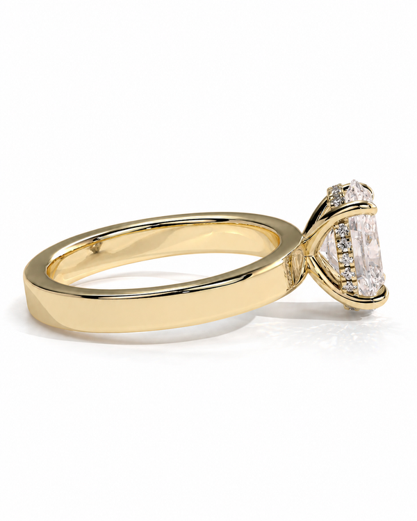 color_10K_YG, color_14K_YG &&A yellow gold ring featuring a large emerald-cut clear center stone in a prong setting, accented by smaller diamonds along the band, shown on a clean white background.