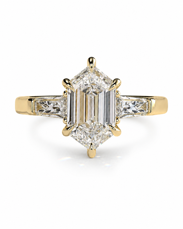 color_10K_YG, color_14K_YG &&A yellow gold ring featuring a large emerald-cut diamond center stone with baguette and round-cut side stones, set against a clean white background.