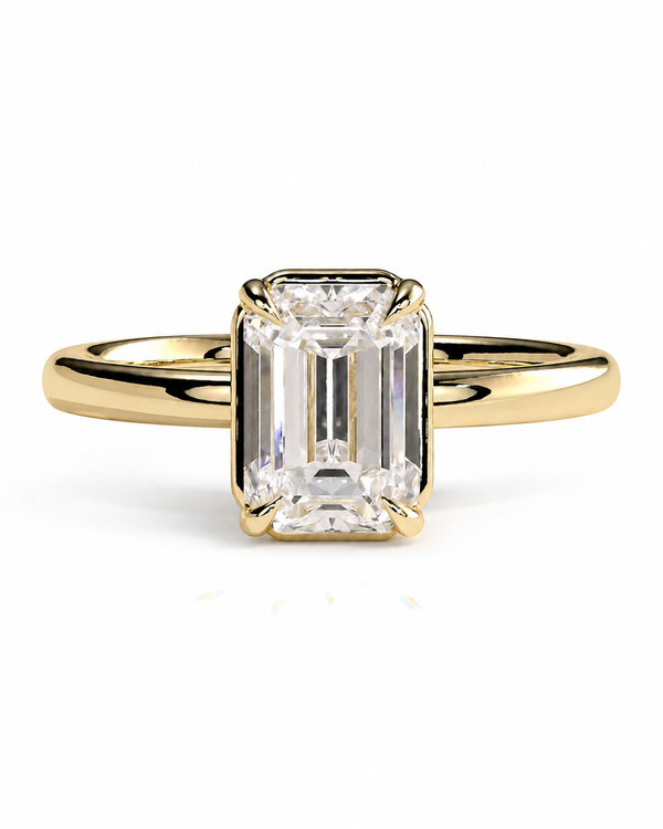 color_10K_YG, color_14K_YG &&An emerald-cut diamond engagement ring in a yellow gold band, shown on a clean white background.