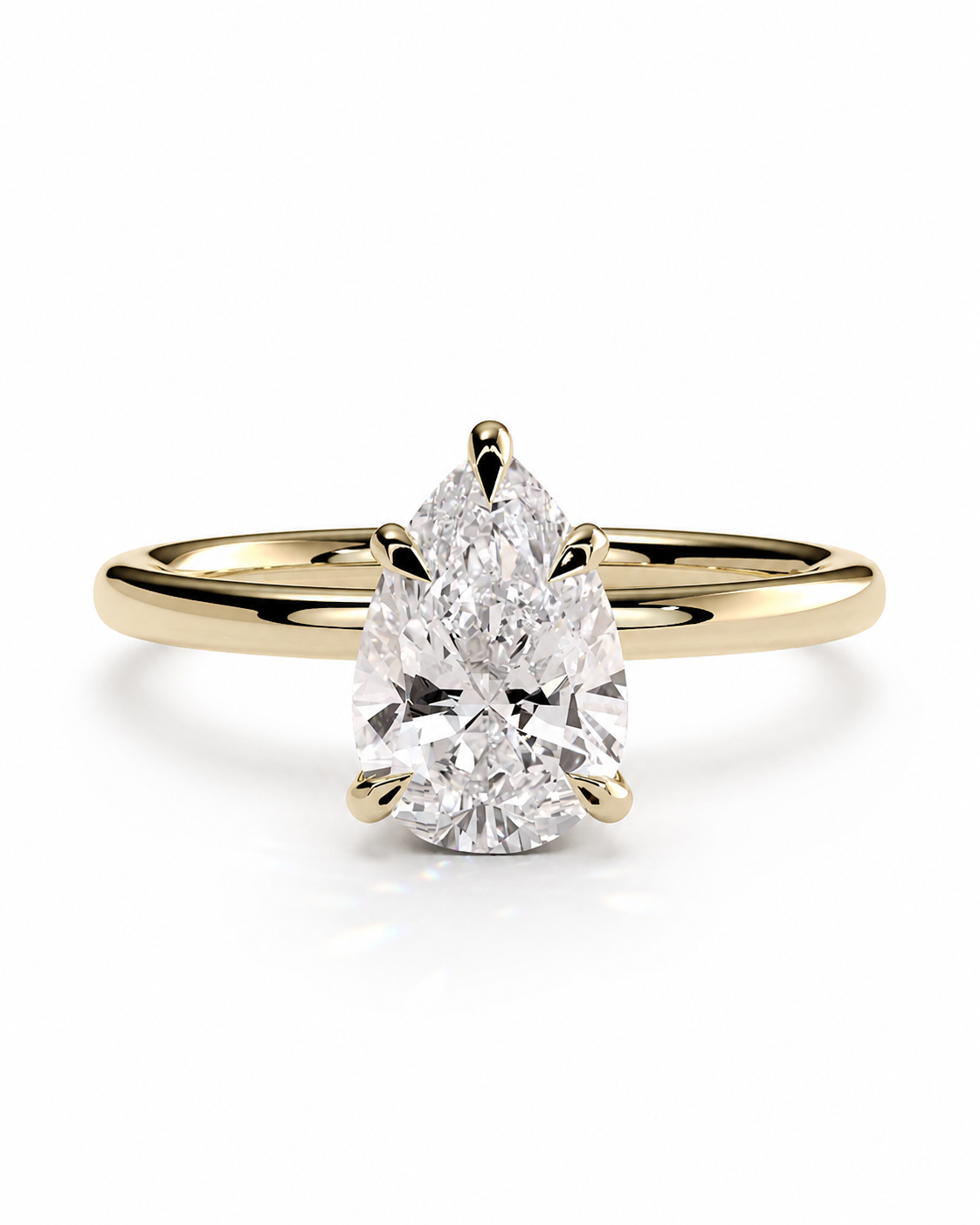 color_10K_YG, color_14K_YG &&
A pear-cut diamond engagement ring with a yellow gold band, shown on a clean white background.