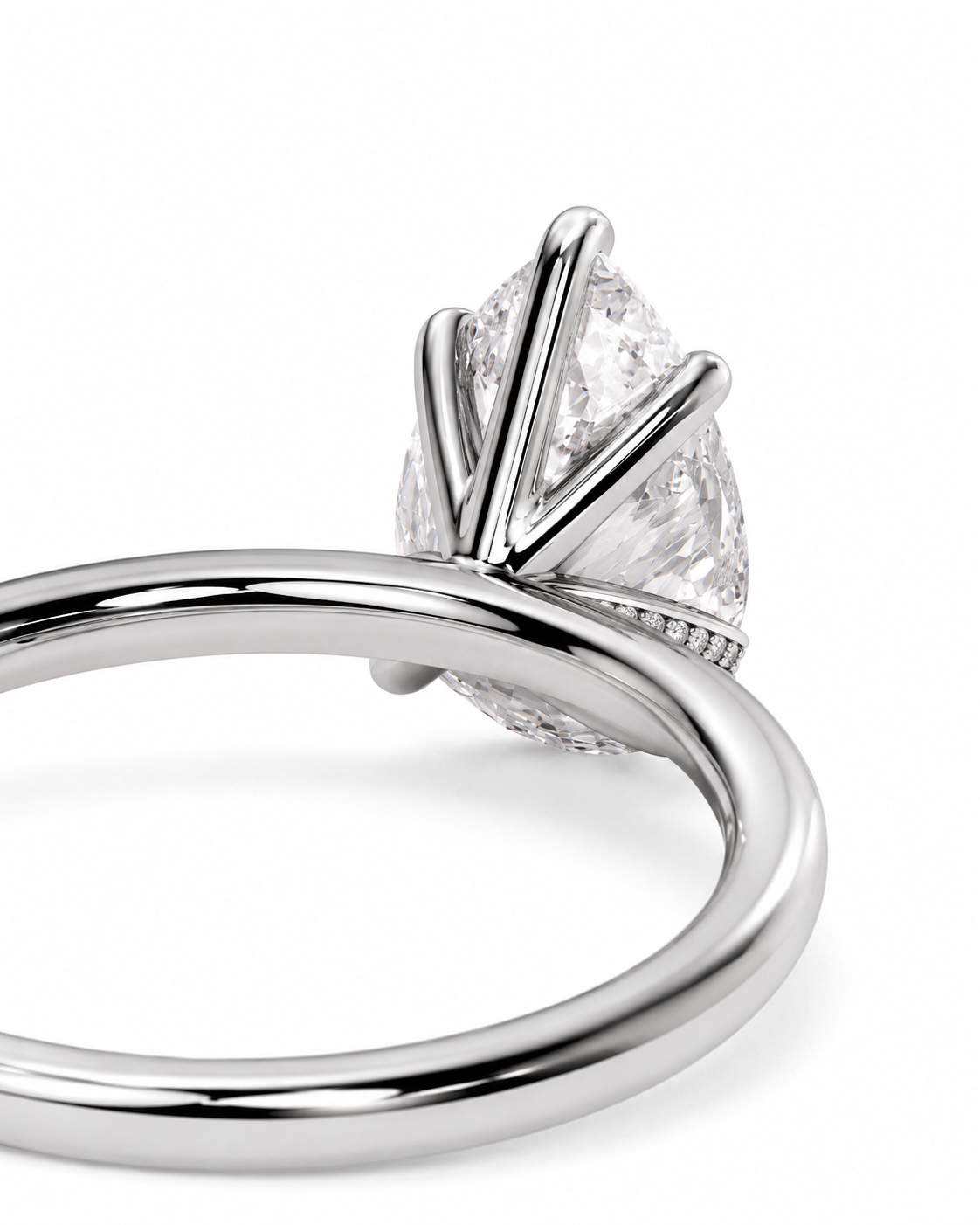 color_925_SIL,color_935_ARG,color_10K_WG, color_14K_WG &&
A close-up studio shot of a silver-toned ring with a marquise-cut clear gemstone in a prong setting, shown against a plain white background.