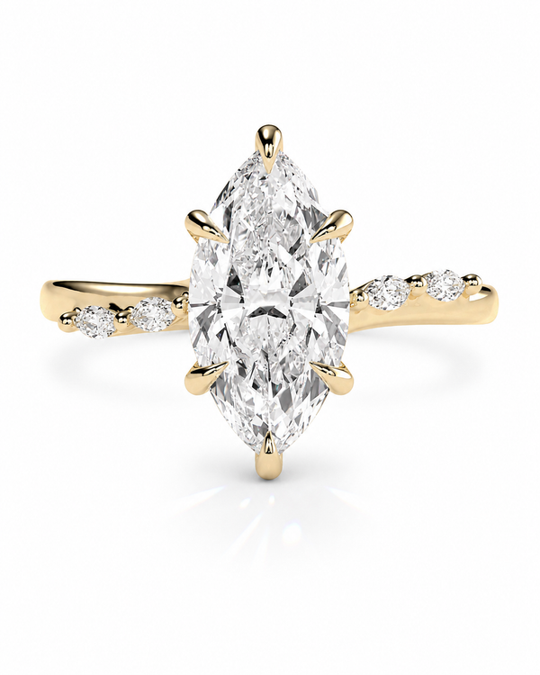 color_10K_YG, color_14K_YG &&A yellow gold ring featuring a large marquise-cut diamond center stone with smaller round diamonds set along the shoulders, shown on a clean white background.