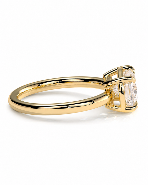 color_10K_YG, color_14K_YG &&A yellow gold ring with a double-band design and a bezel-set clear rectangular gemstone, shown from a side angle on a white background.