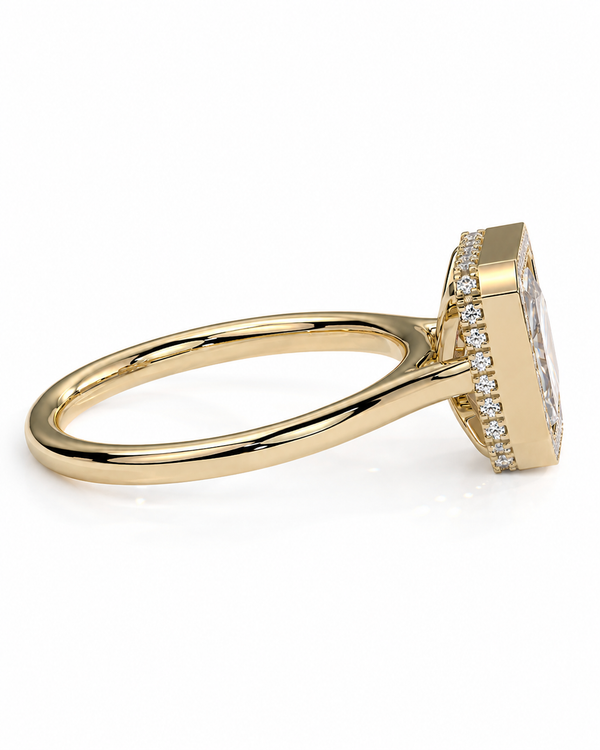 color_10K_YG, color_14K_YG &&A yellow gold ring with a large rectangular clear gemstone surrounded by a halo of small round diamonds, shown on a clean white background.