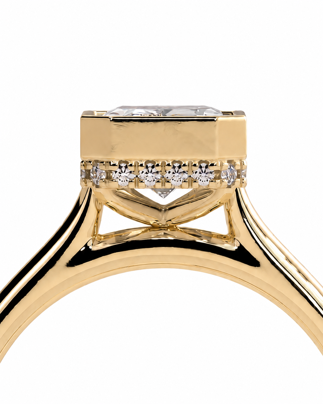 color_10K_YG, color_14K_YG &&A close-up of a yellow gold ring setting with a square-cut clear center stone and a row of small clear accent stones, shown on a plain white background.