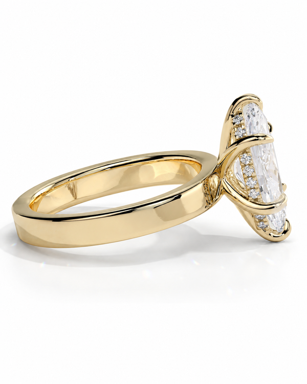 color_10K_YG, color_14K_YG &&A yellow gold ring with a unique butterfly-shaped setting featuring clear baguette and round diamonds, shown on a clean white background.