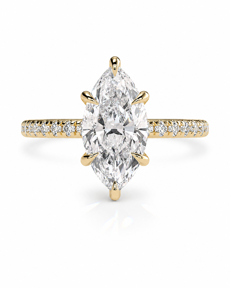 color_10K_YG, color_14K_YG &&A yellow gold ring featuring a large marquise-cut diamond center stone with a pavé band accented by small round diamonds, shown on a clean white background.