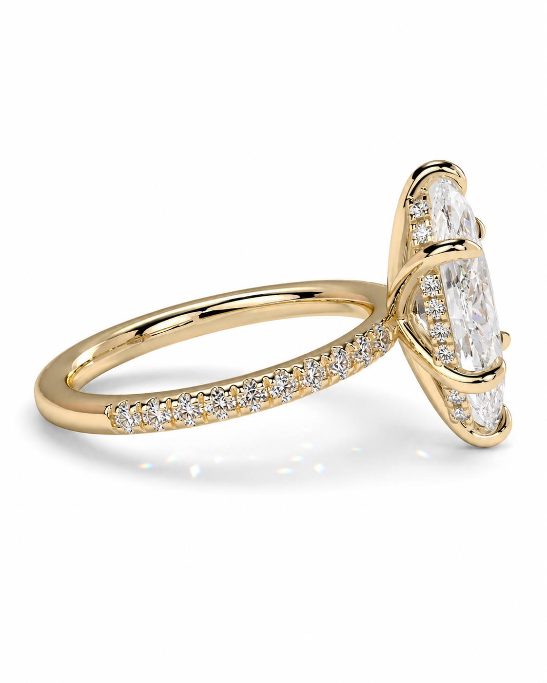 color_10K_YG, color_14K_YG &&A yellow gold ring featuring a large marquise-cut clear center stone and smaller pavé-set diamonds along the band, shown on a clean white background.