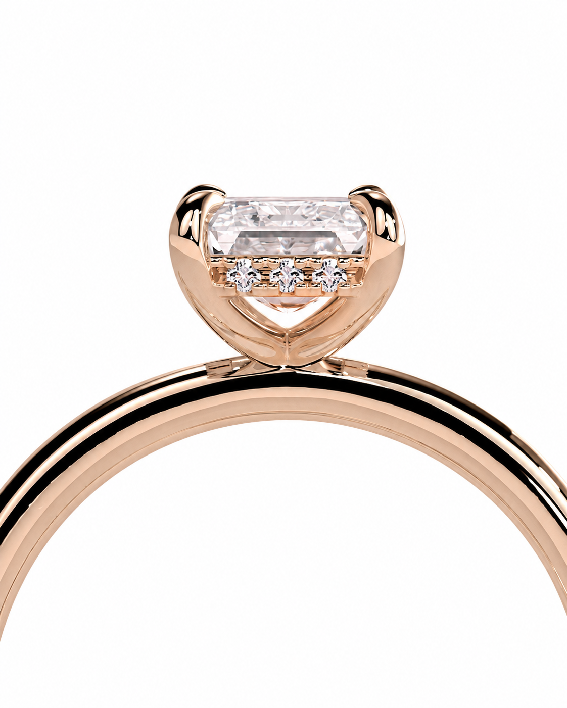 color_10K_RG, color_14K_RG &&
Rose gold engagement ring with a marquise-cut center stone and small round accent stones, shown in a close-up studio shot on a white background.