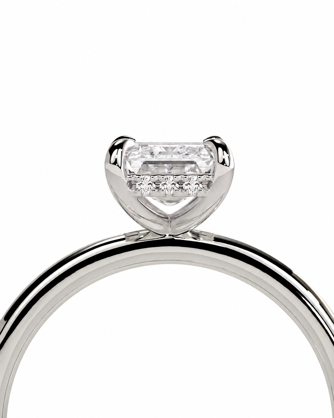 color_925_SIL,color_935_ARG,color_10K_WG, color_14K_WG &&
A close-up of a silver-toned ring with a heart-shaped clear gemstone in a prong setting, shown against a plain white background.