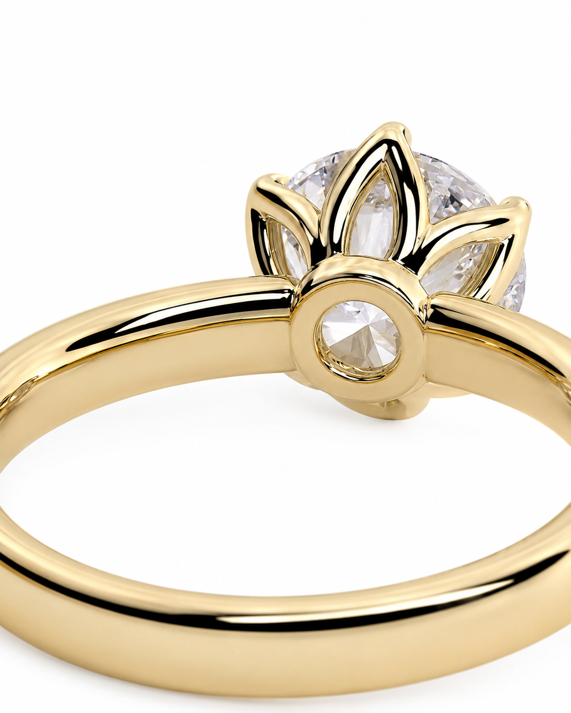 color_10K_YG, color_14K_YG &&A close-up of a yellow gold ring featuring a three-stone cluster setting with clear round-cut gemstones, shown on a clean white background.
