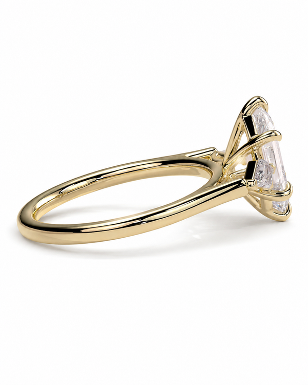 color_10K_YG, color_14K_YG &&A yellow gold solitaire engagement ring featuring a large baguette-cut clear gemstone in a prong setting, shown on a clean white background.