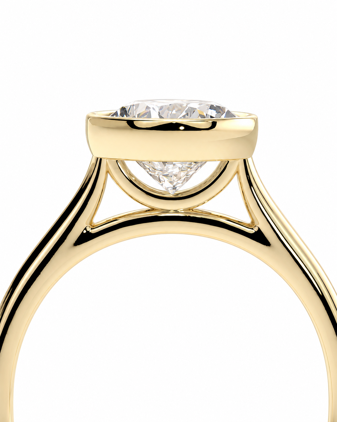 color_10K_YG, color_14K_YG &&A close-up of a yellow gold solitaire engagement ring with a round brilliant-cut diamond center stone, set against a solid white background.