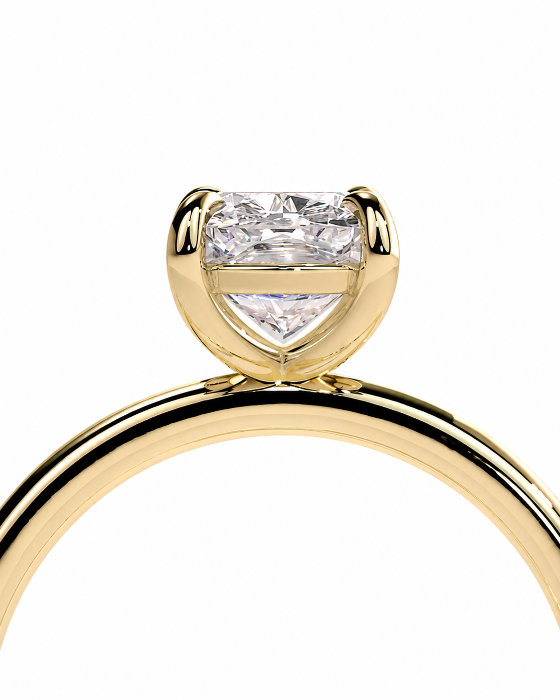 color_10K_YG, color_14K_YG &&A close-up of a yellow gold ring featuring a heart-shaped diamond in a prong setting, shown against a solid white background.