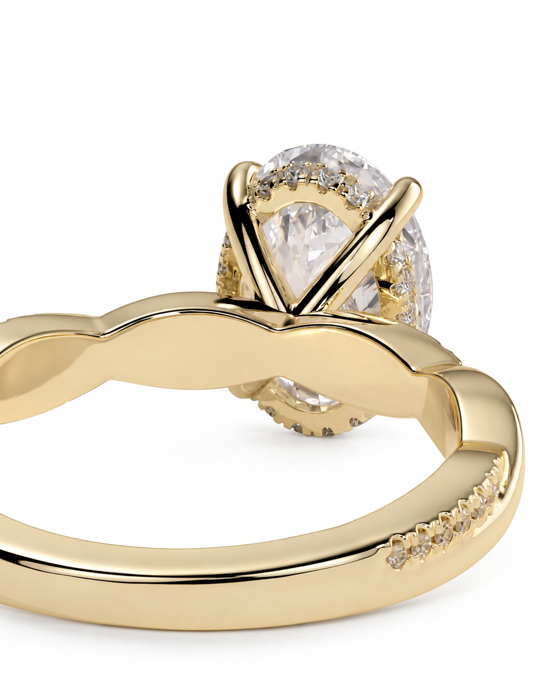 color_10K_YG, color_14K_YG &&A close-up of a gold ring featuring a large oval clear gemstone in a prong setting, with smaller accent stones along the band, shown on a white background.