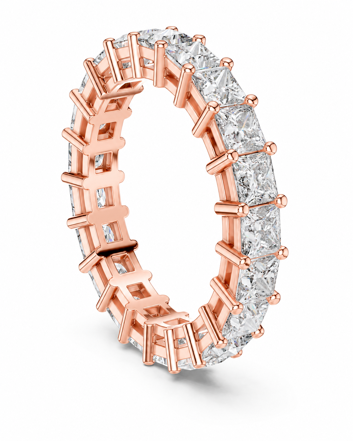 color_10K_RG, color_14K_RG &&	A rose gold eternity ring featuring a continuous channel setting of clear rectangular baguette-cut diamonds, shown on a clean white background.