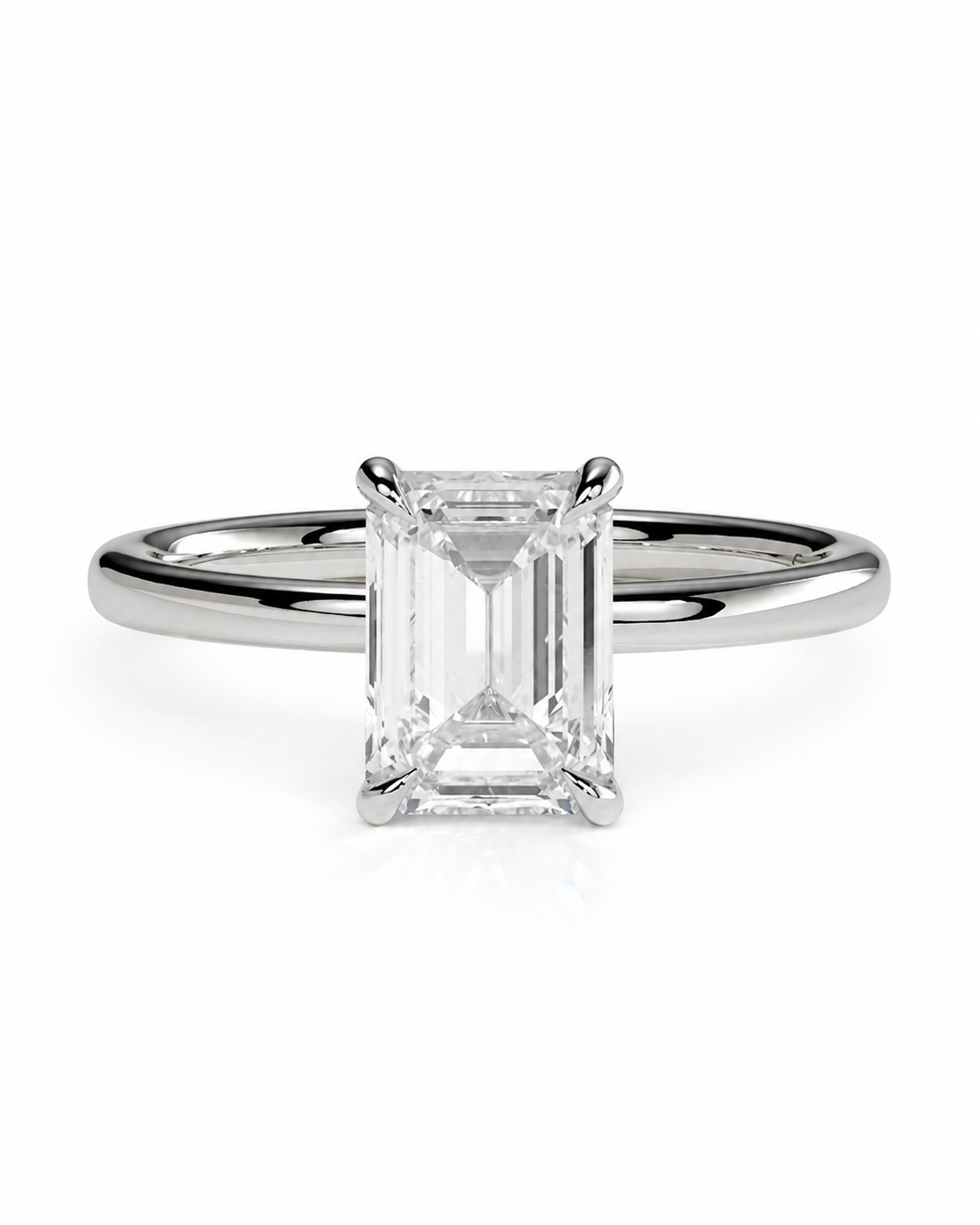 color_925_SIL,color_935_ARG,color_10K_WG, color_14K_WG &&
An emerald-cut diamond engagement ring with a polished silver-colored band, shown on a clean white background.
