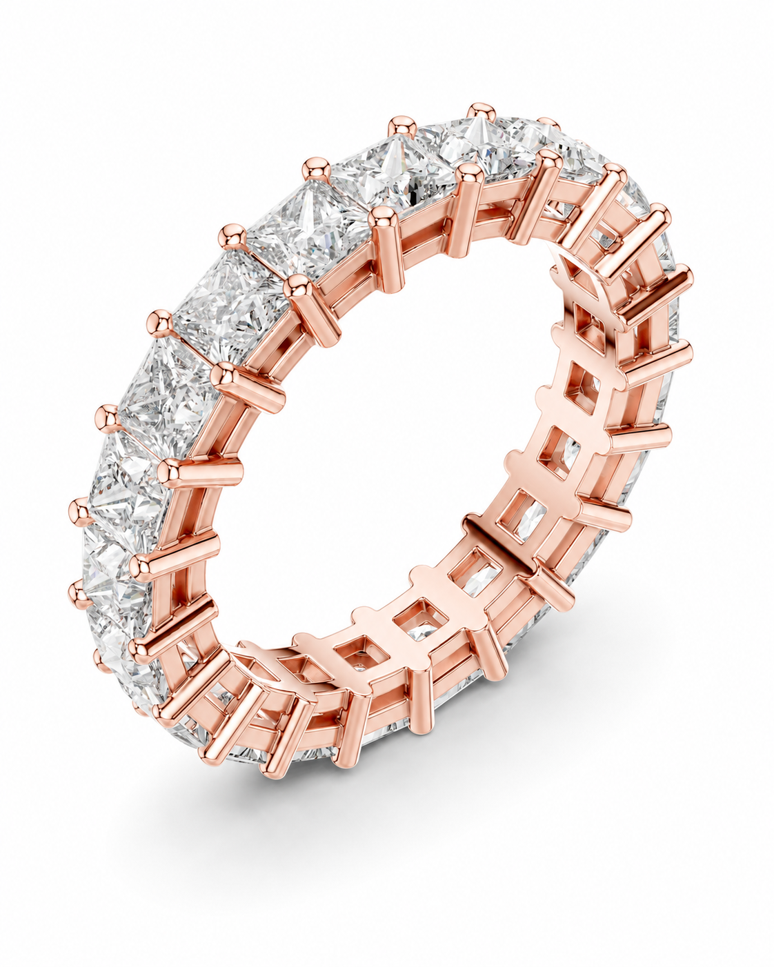 color_10K_RG, color_14K_RG &&	A rose gold eternity ring featuring a continuous line of round brilliant-cut diamonds in a prong setting, shown on a clean white background.