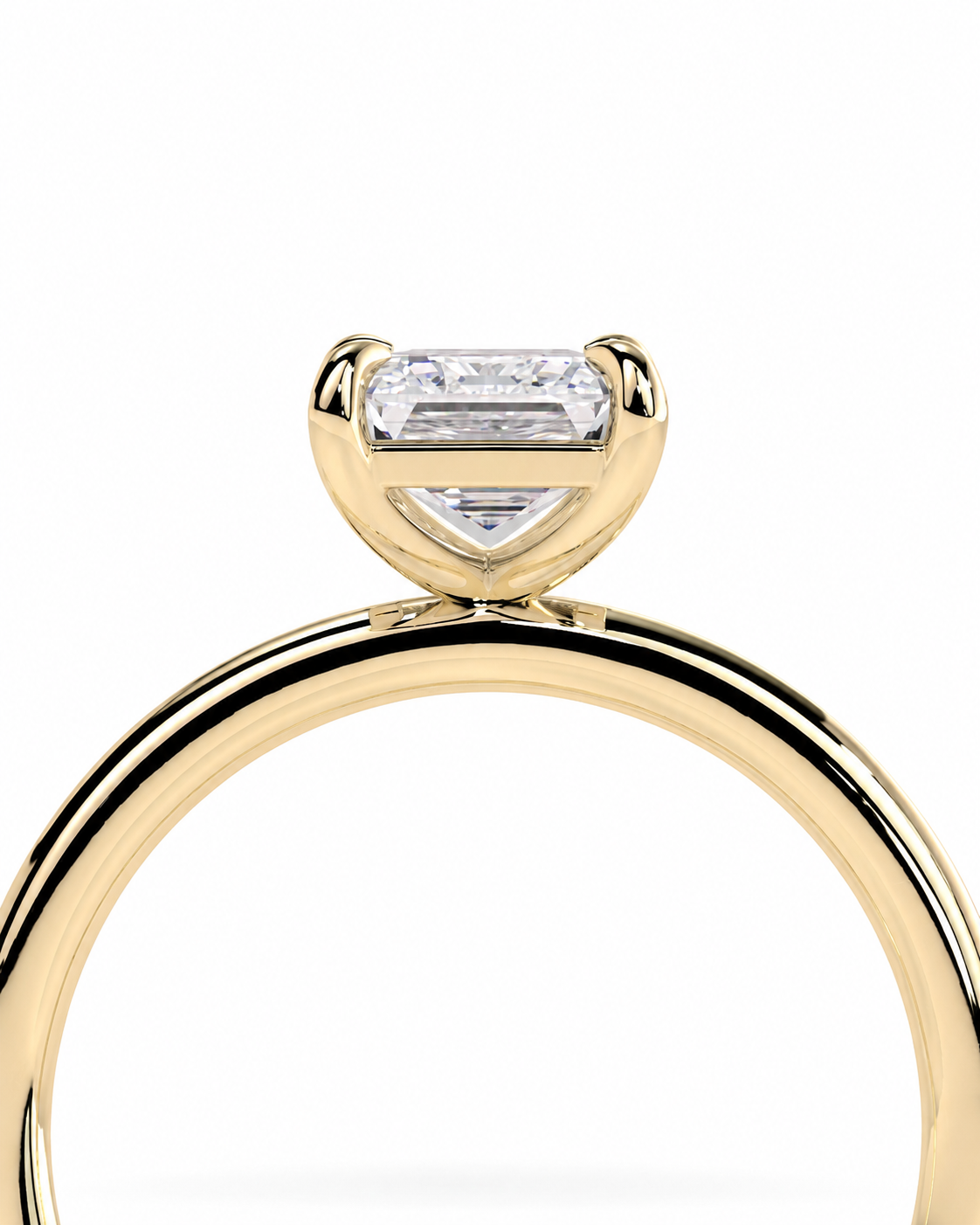 color_10K_YG, color_14K_YG &&
A close-up of a yellow gold ring featuring a marquise-cut diamond solitaire in a half-prong setting, shown against a solid white background.