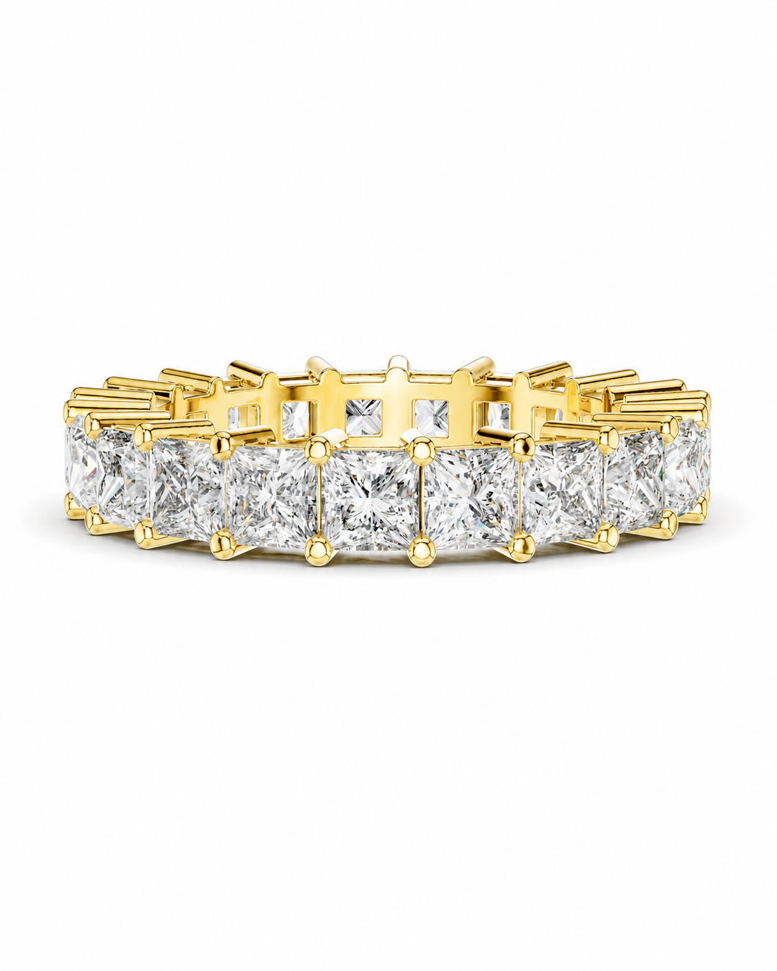 color_10K_YG, color_14K_YG &&	
A yellow gold eternity ring featuring a continuous row of princess-cut clear diamonds in a prong setting, shown against a plain white background.