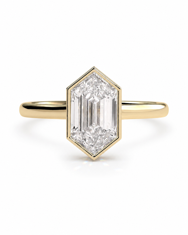 color_10K_YG, color_14K_YG &&A yellow gold ring featuring a large, hexagonal baguette-cut diamond center stone, set against a clean white background.