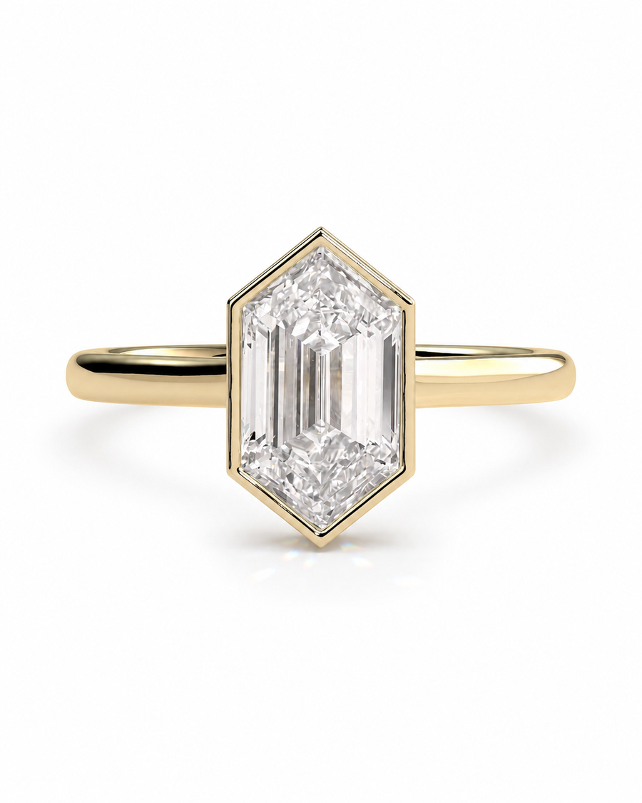 color_10K_YG, color_14K_YG &&A yellow gold ring featuring a large, hexagonal baguette-cut diamond center stone, set against a clean white background.