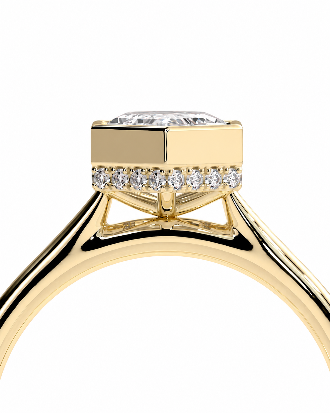 color_10K_YG, color_14K_YG &&A close-up of a yellow gold ring featuring a rectangular cushion-cut diamond center stone, a halo of small round diamonds, and a split shank design, set against a plain white background.