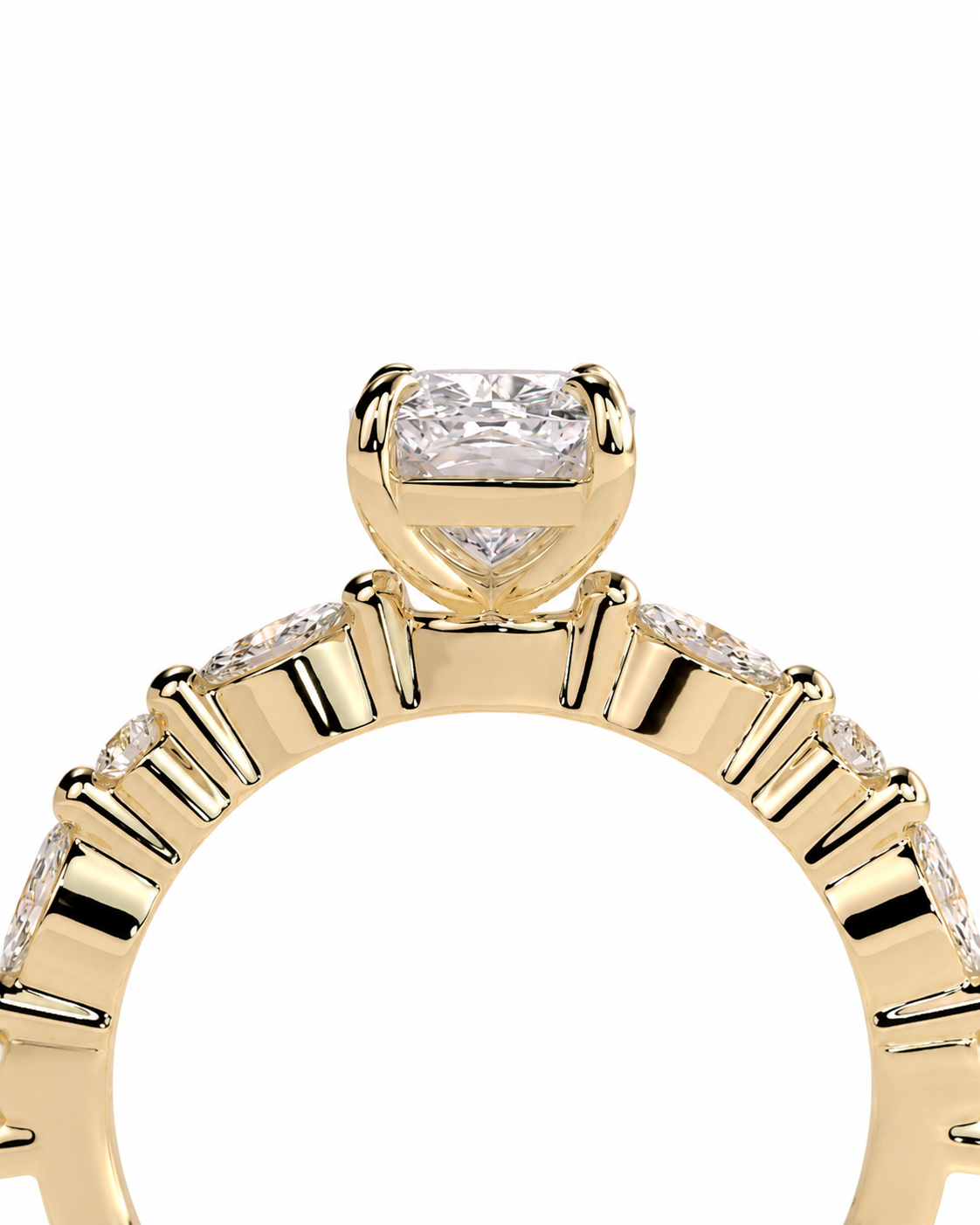 color_10K_YG, color_14K_YG &&Close-up of a yellow gold ring featuring a princess-cut diamond center stone and a halo of smaller round diamonds along the band, set against a plain white background.