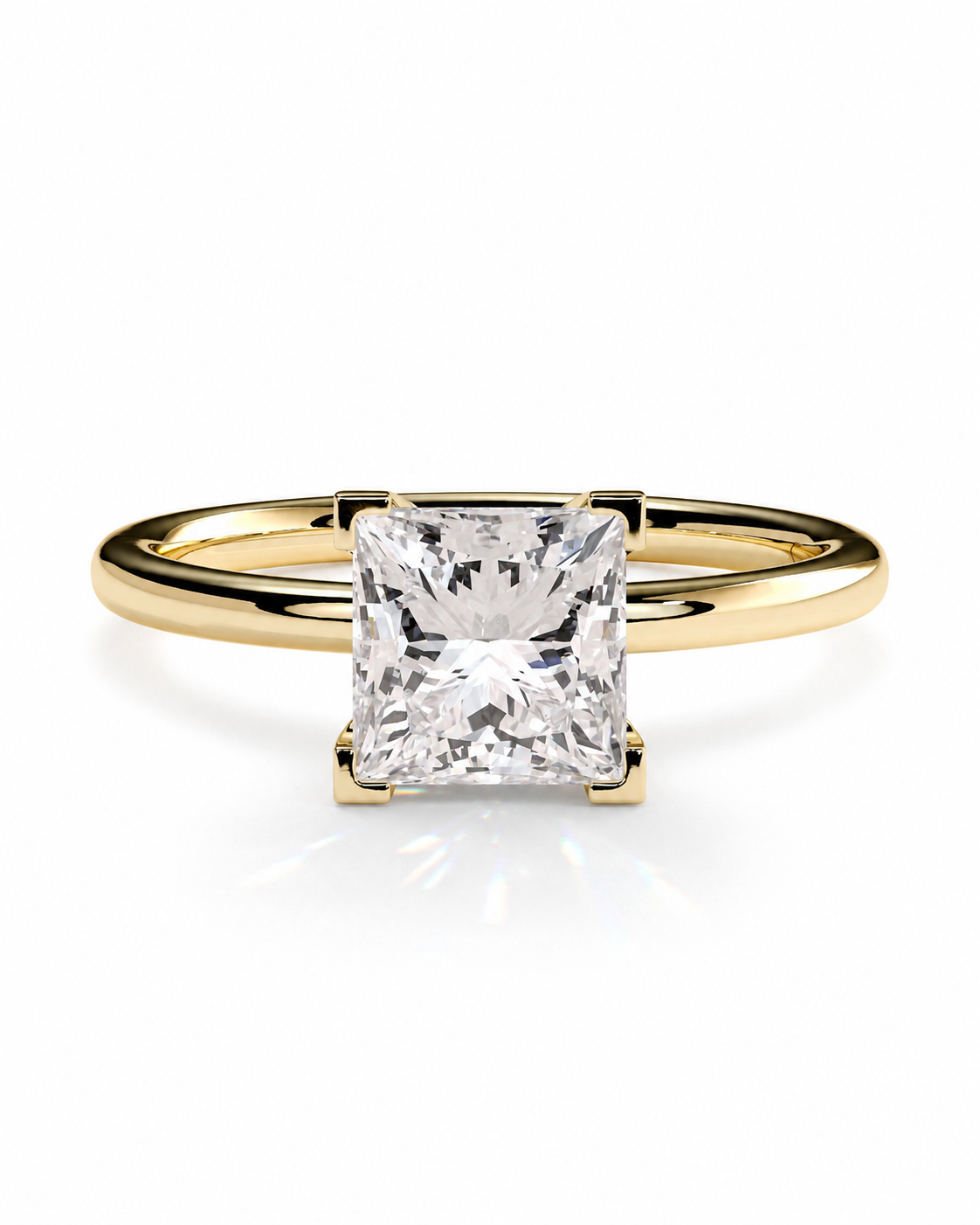 color_10K_YG, color_14K_YG &&A yellow gold solitaire engagement ring featuring a large, square princess-cut clear diamond in a four-prong setting, shown on a clean white background with a soft reflection.