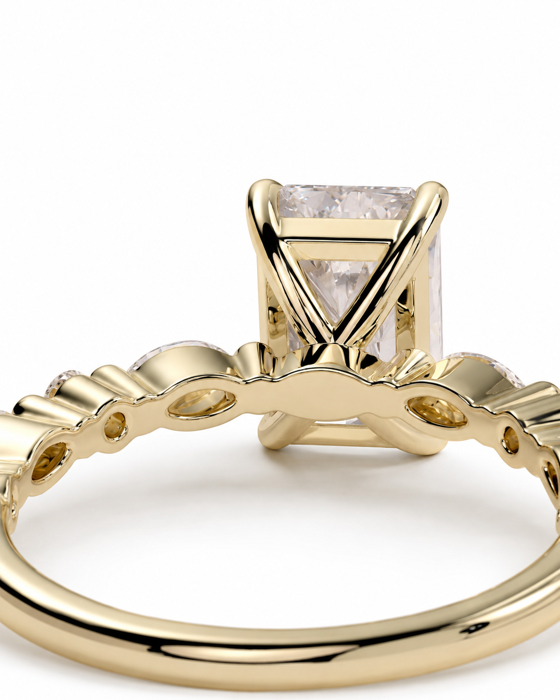 color_10K_YG, color_14K_YG &&Close-up of a yellow gold ring with a rectangular clear gemstone in a prong setting, shown on a white background.
