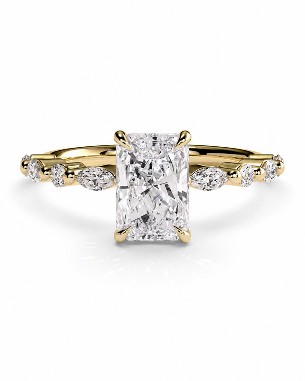 color_10K_YG, color_14K_YG &&A yellow gold engagement ring featuring a large rectangular radiant-cut diamond center stone with smaller marquise and round diamonds set along a split shank, shown on a clean white background.