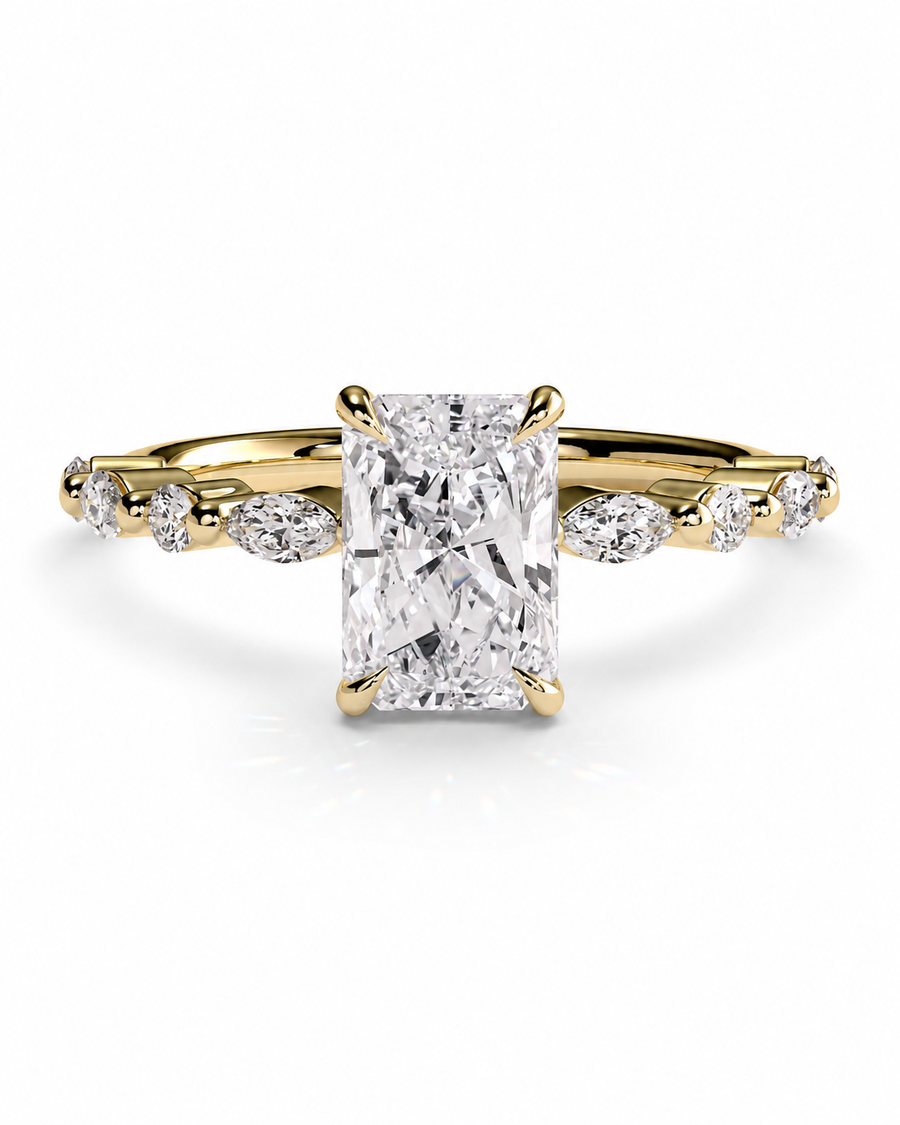 color_10K_YG, color_14K_YG &&A yellow gold engagement ring featuring a large rectangular radiant-cut diamond center stone with smaller marquise and round diamonds set along a split shank, shown on a clean white background.